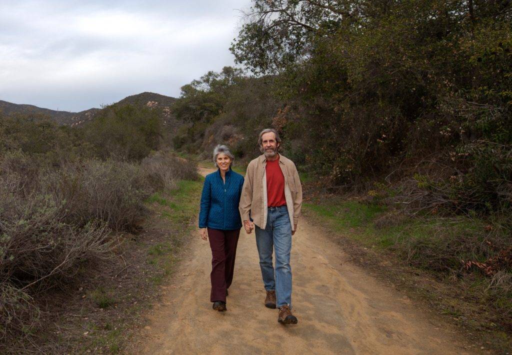 Martha Blane and Leonard Wittwer walking on the LeoMar Preserve.