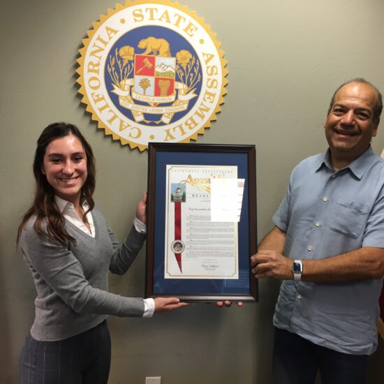 Conservancy board member Richard Murphy accepts a resolution from the state of California last month.